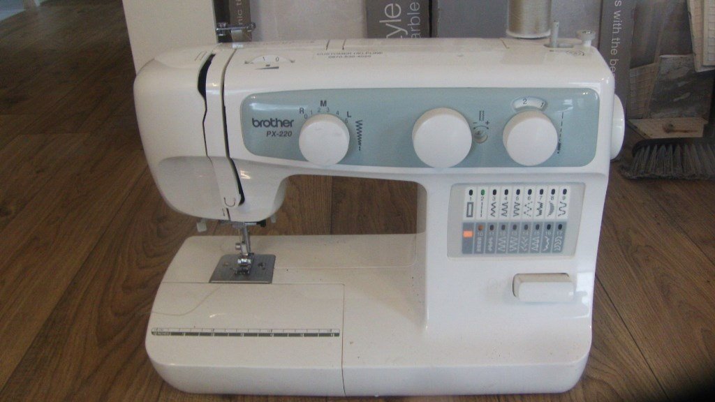 Brother PX220 sewing machine with cover and pedal in Okehampton