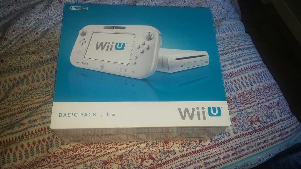 boxed white wii u console complete with leads and games in Perth