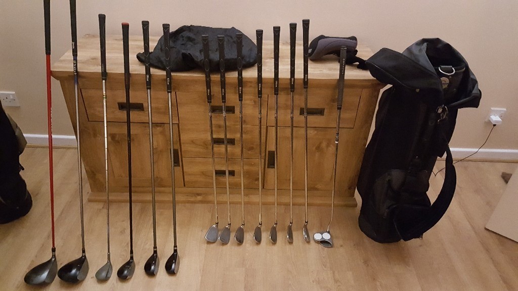 Full set of golf clubs with bag and collapsible trolley. Spectacular