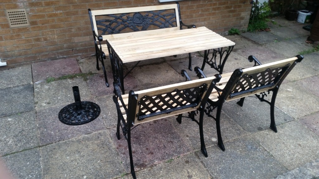 CAST IRON GARDEN FURNITURE 5 PIECE TABLE, BENCH, 2 CHAIRS AND PARASOL