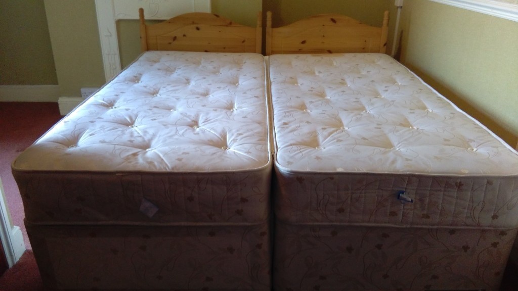 Two single beds with mattresses that zip together, good condition (No