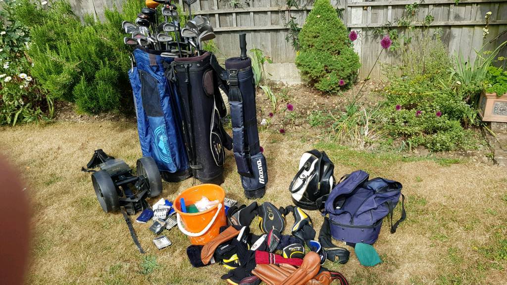 Set of 49 used golf clubs 3 golf caddies, golf cart, bucket of T's, ect