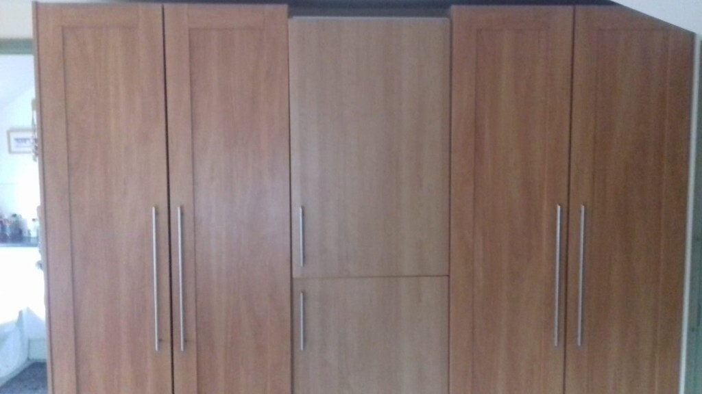 2 free standing wardrobes. approx 2 metres tall X 1 metre wide wide