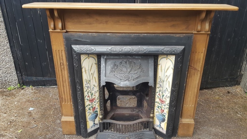Victorian/Edwardian reproduction cast iron fireplace with wooden