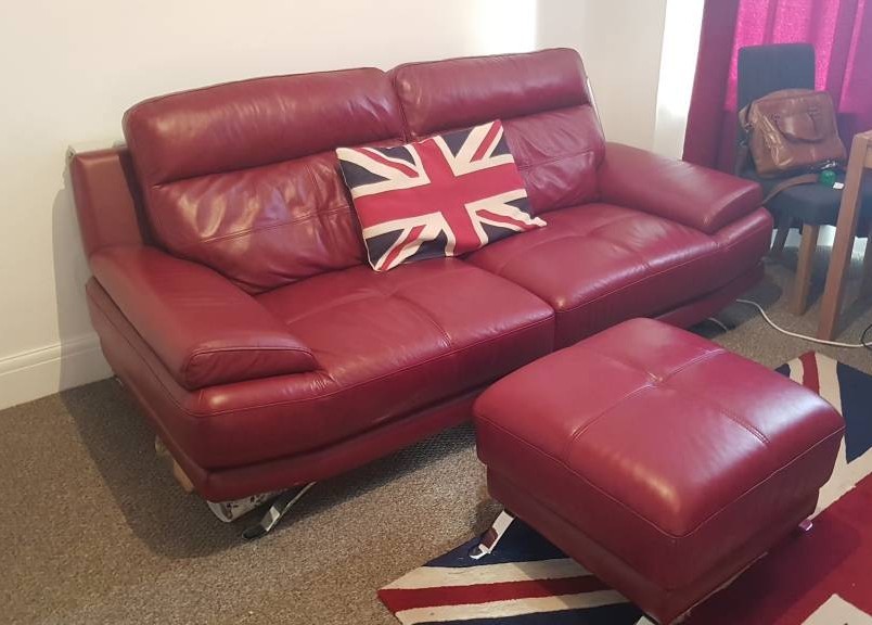 Red Leather Harveys 3 Seater Sofa 1 Yr Old with foot stool in