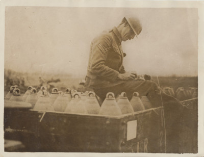 REPRINT OF ORIGINAL WWI PHOTO OF SOLIDER CHECKING SHELLS ON WESTERN FRONT