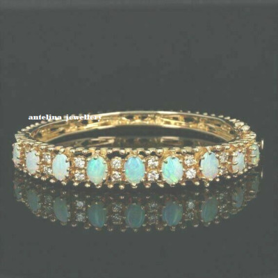 12 Ct Oval Lab-Created Fire Opal 7.25'' Bangle Bracelet 14K Yellow Gold Plated