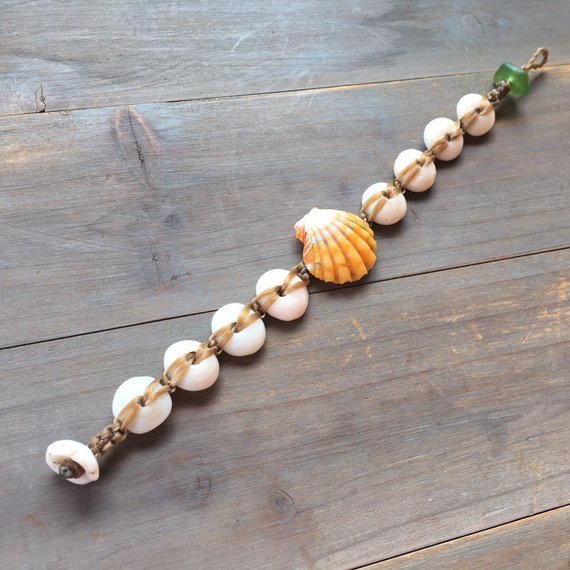 Hawaiian sunrise shell with puka shell bracelet