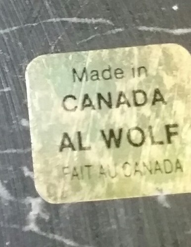CANADIAN AL WOLF'S ESKIMO WITH DOG IN SLED  --- MADE IN CANADA