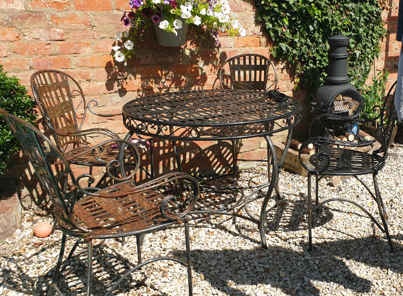 Wrought iron garden table and chairs | in Barrow-upon-Humber, Lincolnshire | Gumtree