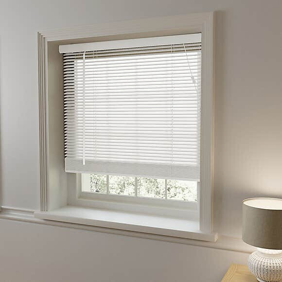 White faux wooden blinds by Dunelm in Wallasey, Merseyside