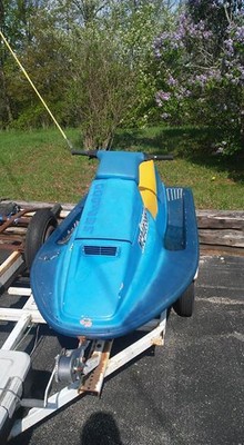 1990 Seadoo/bombardier 583 plus two place trailer and stand/cart