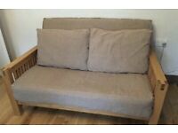 Fantastic 2 seater solid oak sofa bed by Futon Company,great condition 