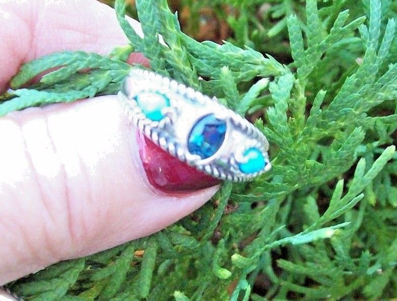 CAROLYN POLLACK POSSIBILITIES RING SIZE 9 WITH TURQUOISE/BLUE TOPAZ