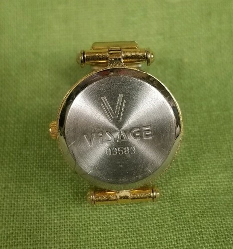 Visage Signed Black Enamel Quartz Vintage Expandable Band Ring Watch Gold Tone