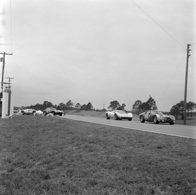 Gaston Andrey Alfa Romeo Giulia TZ2 leads Hap Sharp Jim Hall Chapa- 1966 Photo 1