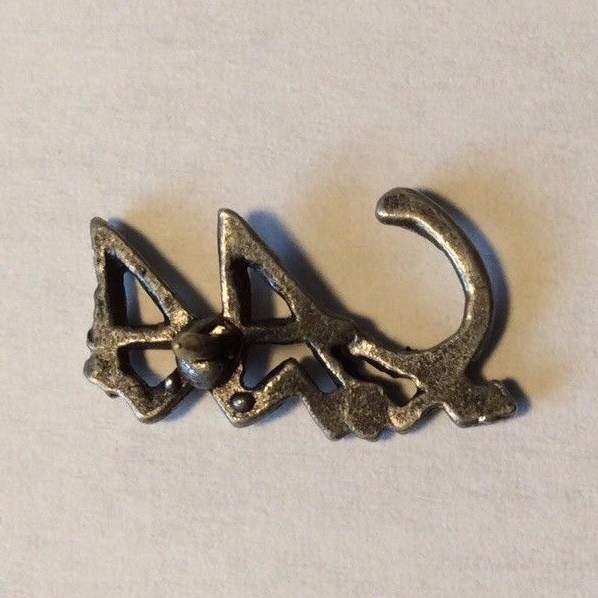 Vintage CAA Scewback Lapel Pin Canadian Automobile Association?