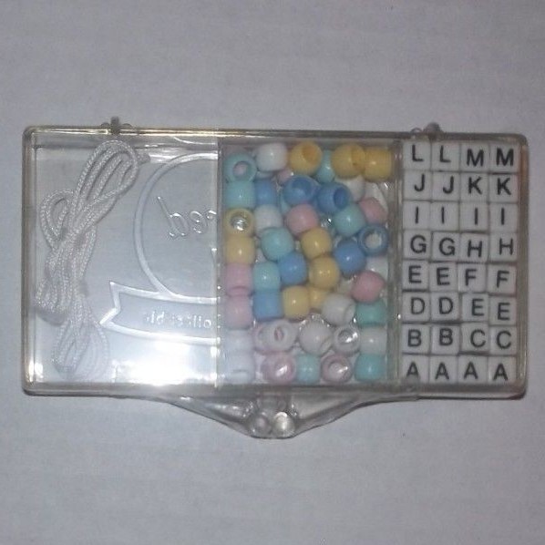treasured child beads and letters to make doll  bracelets