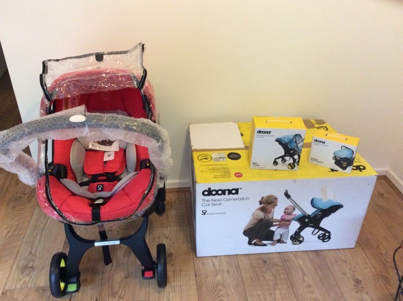 NEW BOXED DOONA CAR SEAT & PUSHCHAIR ALL IN ONE + RAIN COVER & SEAT