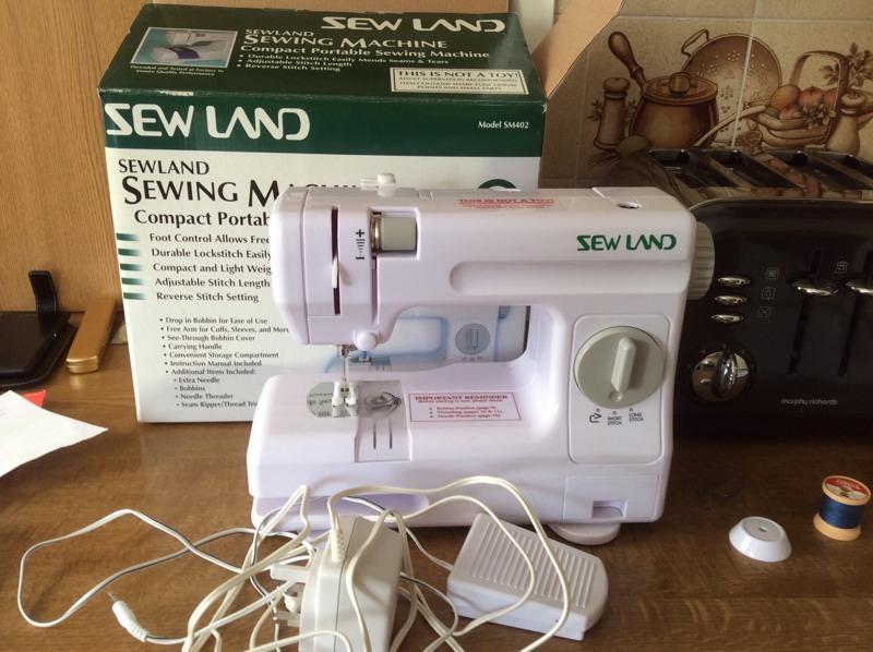 SEWING MACHINE, COMPACT PORTABLE , ELECTRIC, SEWLAND MODEL SM402, BRAND