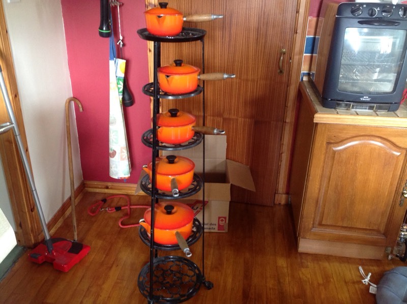 Vintage Cast Iron Pot Stand with 5 Vintage Volcanic Orange Le Creuset