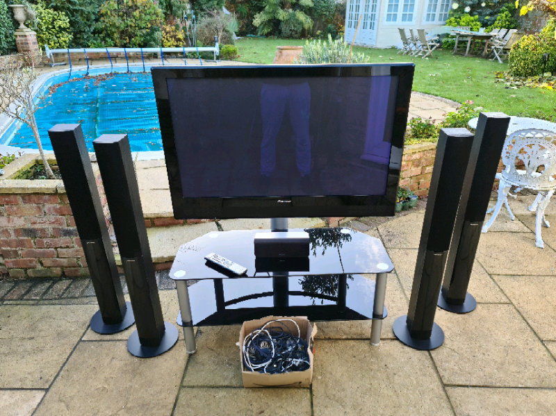 42 inch HD Pioneer Plasma TV with stand and Pioneer surround sound in