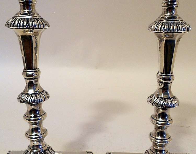 A good set of 4 cast sterling silver candlesticks, Ebenezer Coker, London 1762.