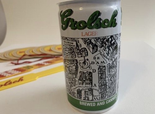 Vintage Grolsch Memorabilia: Beer Can, Yellow Plastic Spatel Glide, and Coasters