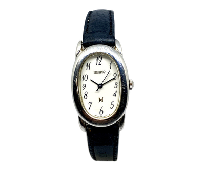 SEIKO NOIE 1F21-5B70 Ladies Quartz Watch White Dial Oval SS