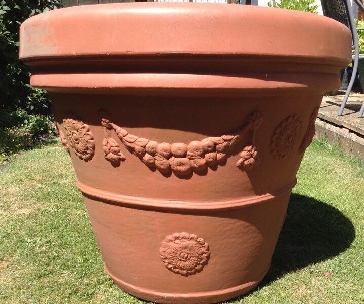  Giant  plastic terracotta  plant pot  in Romford London 