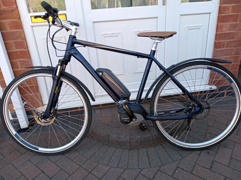 Carrera crossfuse mens electric hybrid bike online