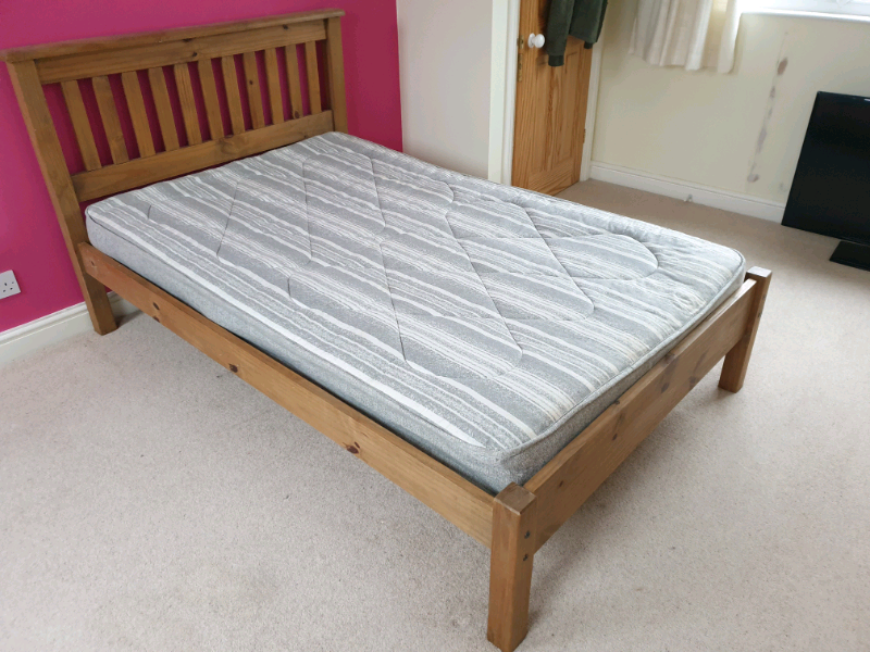 Wooden double bed with free mattress. (4ft x 6ft) in St