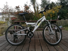 LIKE NEW RIDGE FULL SUSPENSION MOUNTAIN BIKE IN IMMACULATE CONDITION.