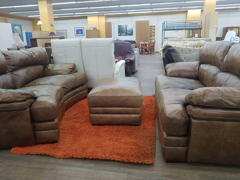 Tan leather curved 2 seater and 2 seater sofa with matching footstool | in Blyth, Northumberland 