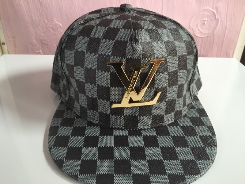 Louis Vuitton black SnapBack with gold logo - brand new | in Northolt, London | Gumtree