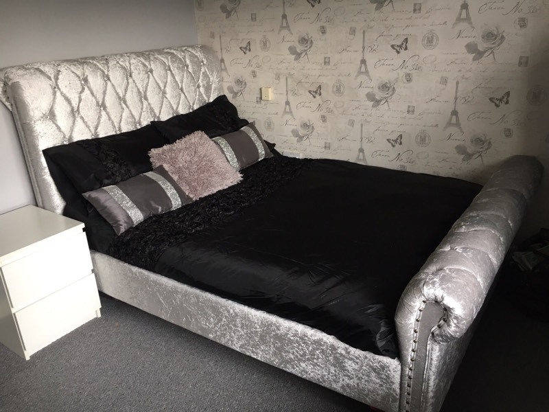 Silver crushed velvet sleigh bed with diamond buttons in Leeds, West