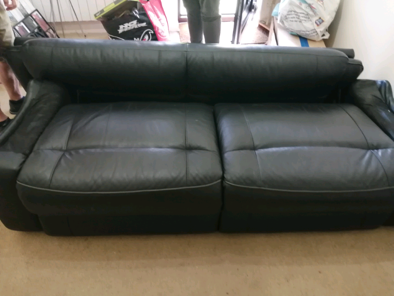 Black Leather Sofa Comes Apart In Two Sections In Stanway