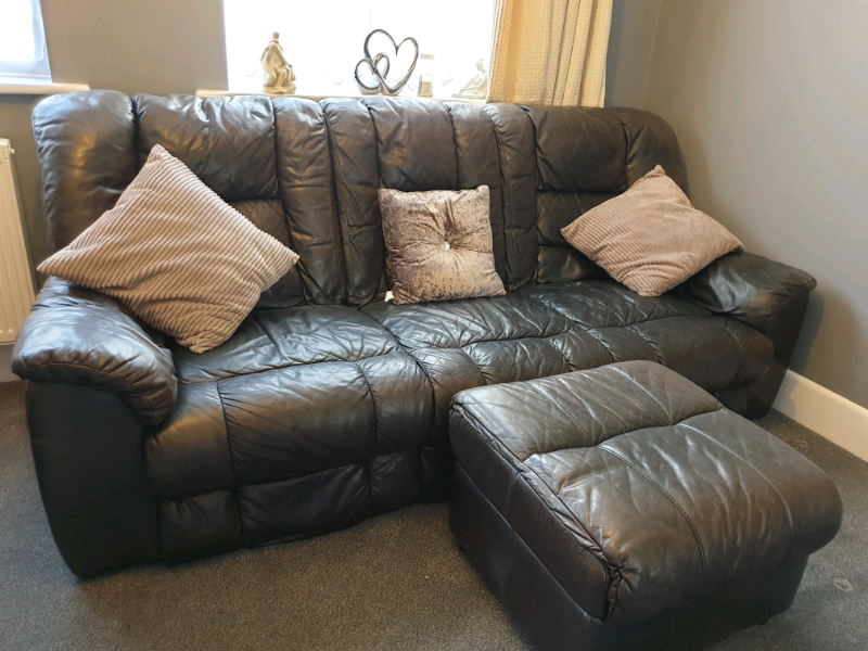 3 seater leather sofa with matching footstool in Worthing, West