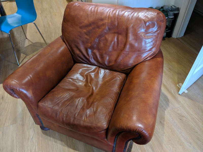 Brown leather armchair | in Exeter, Devon | Gumtree