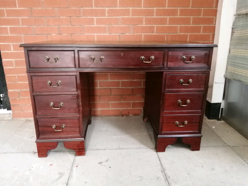 A Solid Dark Mahogany Twin Pedestal Green Leather Inlay Desk in