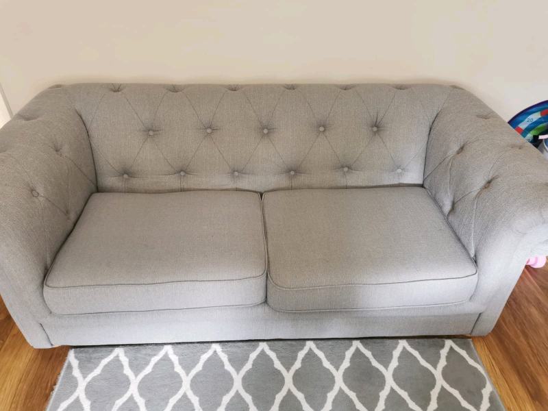 DFS button back 3 seater sofa and matching pouffe grey | in Wilton, Wiltshire | Gumtree