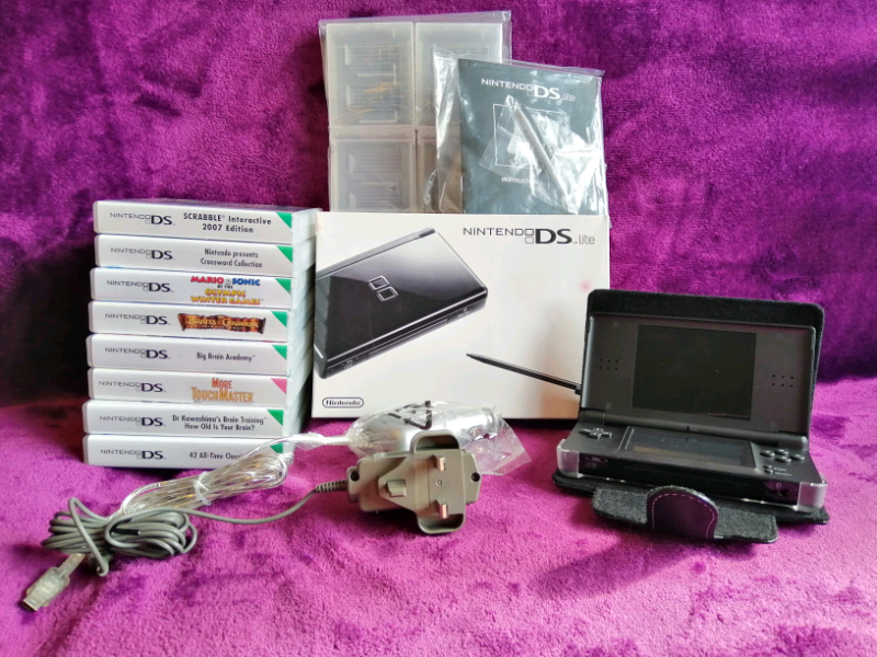 Nintendo DS lite boxed like new, leather travel case & accs + 8 games