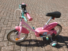 Girls btwin bike with stabilisers