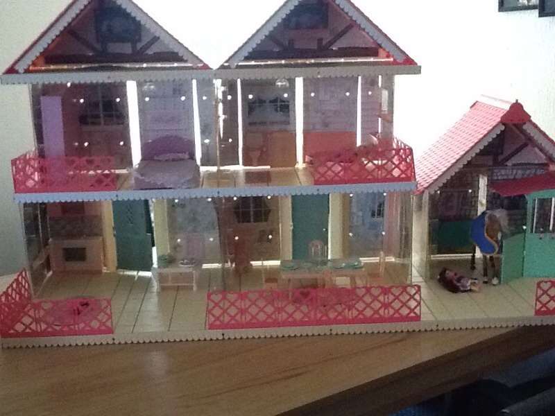 Vintage cassy dolls house with stables horse doll night club and