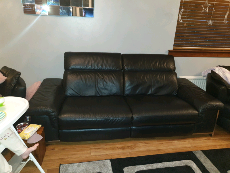 Black leather 4 seater reclining sofa. Dfs iconica. in East Kilbride