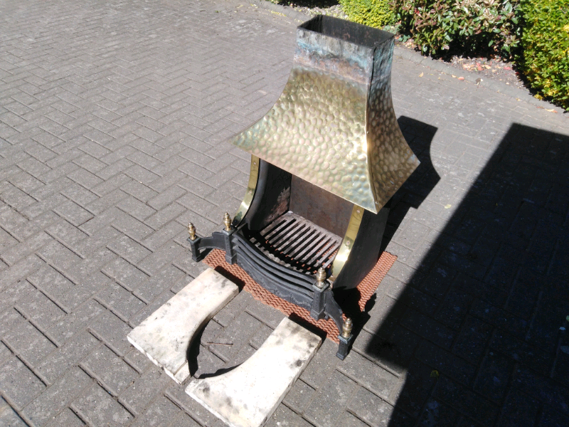 Fireplace dog grate with brass canopy in Swadlincote, Derbyshire