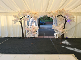 Blossom arch trees and centerpieces hire