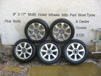 5 OZ. ALLOY WHEELS WITH PART WORN TYRES