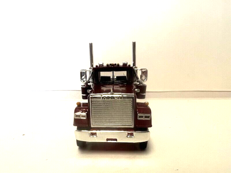 DCP / FIRST GEAR  1/64 SCALE  MACK SUPER LINER, DAY CAB, MAROON, RED FRAME