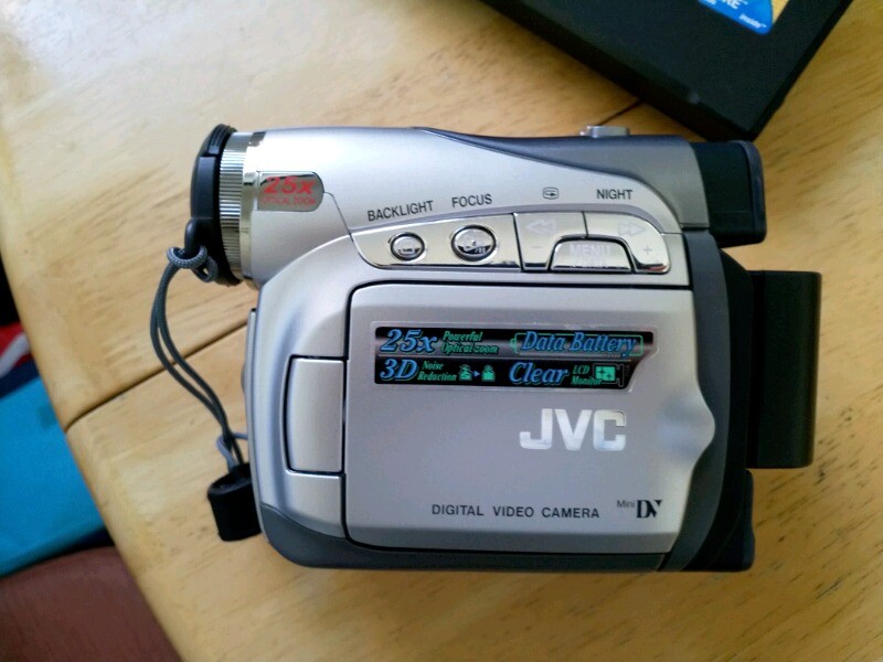 JVC mini dv camcorder as new condition including tapes, carry bag in
